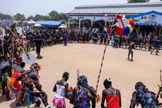 A group of Chadian and Cameroonian dancers from the Massa people perform a Guruna, a traditional Massa dance, during the Tokna Massana Festival in Bongor on April 10, 2026. The culture of the Massa people was celebrated at the 10th edition of the Tokna Massana festival.
This year's celebration took on a special significance following the inscription last December of Guruna, a Massa pastoral initiation ritual, on UNESCO's list of intangible cultural heritage. (Photo by Joris Bolomey / AFP)