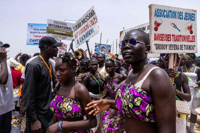 A group of Massa women prepares to march during the Tokna Massana Festival in Bongor on April 10, 2026. The culture of the Massa people was celebrated at the 10th edition of the Tokna Massana festival.
This year's celebration took on a special significance following the inscription last December of Guruna, a Massa pastoral initiation ritual, on UNESCO's list of intangible cultural heritage. (Photo by Joris Bolomey / AFP)