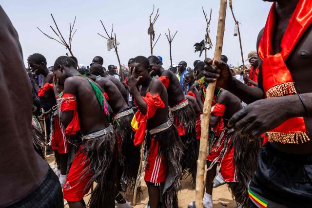 Cameroonian dancers parade during the Tokna Massana Festival in Bongor on April 10, 2026. The culture of the Massa people was celebrated at the 10th edition of the Tokna Massana festival.
This year's celebration took on a special significance following the inscription last December of Guruna, a Massa pastoral initiation ritual, on UNESCO's list of intangible cultural heritage. (Photo by Joris Bolomey / AFP)