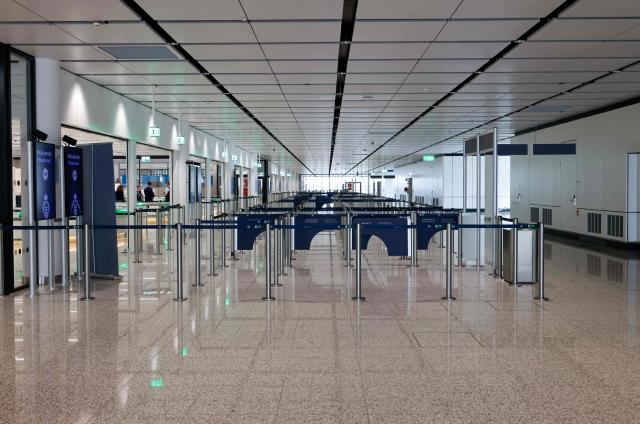 This photo taken on April 13, 2026 shows a gateway for families with children of up to six years at the security check area of the new Terminal 1 pier at Munich International Airport in Munich, southern Germany. The Terminal 1 Pier provides additional capacity for up to six million passengers per year. The new building is currently one of Bavaria’s largest infrastructure projects. (Photo by ALEXANDRA BEIER / AFP)