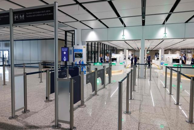 This photo taken on April 13, 2026 shows a gateway for families with children of up to six years at the security check area of the new Terminal 1 pier at Munich International Airport in Munich, southern Germany. The Terminal 1 Pier provides additional capacity for up to six million passengers per year. The new building is currently one of Bavaria’s largest infrastructure projects. (Photo by ALEXANDRA BEIER / AFP)