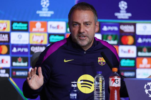 Barcelona's German coach Hans-Dieter Flick gives a press conference on the eve of their UEFA Champions League quarter final second leg football match against Club Atletico de Madrid at Metropolitano Stadium in Madrid, on April 13, 2026. (Photo by Thomas COEX / AFP)