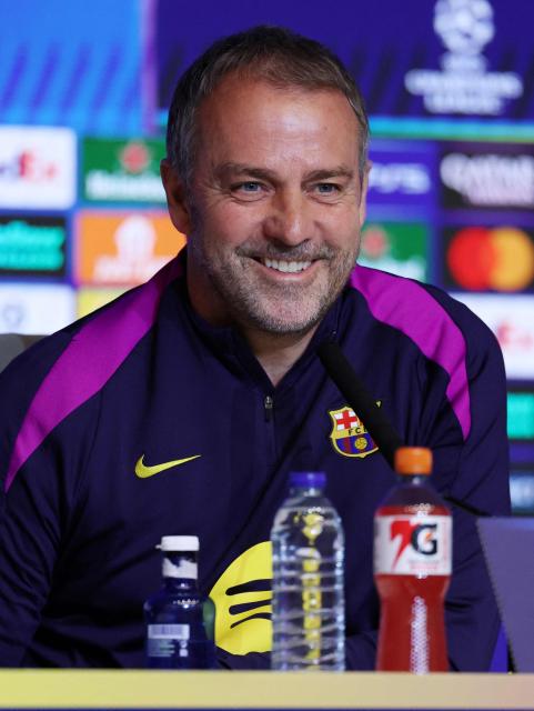 Barcelona's German coach Hans-Dieter Flick gives a press conference on the eve of their UEFA Champions League quarter final second leg football match against FC Barcelona at Metropolitano Stadium in Madrid, on April 13, 2026. (Photo by Thomas COEX / AFP)