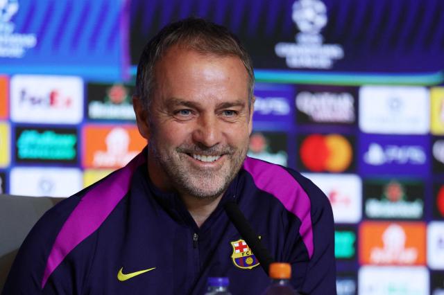 Barcelona's German coach Hans-Dieter Flick gives a press conference on the eve of their UEFA Champions League quarter final second leg football match against Club Atletico de Madrid at Metropolitano Stadium in Madrid, on April 13, 2026. (Photo by Thomas COEX / AFP)