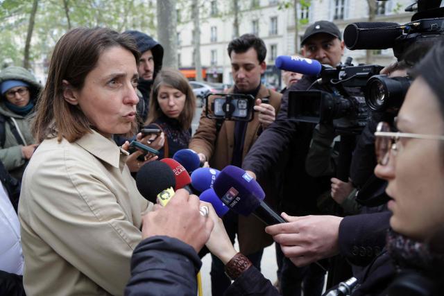 French trade union General Confederation of Labour (CGT) secretary general Sophie Binet addresses the media as she arrives for a meeting with France's Labour Minister Jean-Pierre Farandou to discuss the proposed May 1st bill, in Paris on April 13, 2026. (Photo by Ludovic MARIN / AFP)