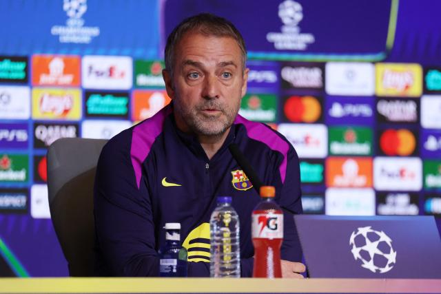 Barcelona's German coach Hans-Dieter Flick gives a press conference on the eve of their UEFA Champions League quarter final second leg football match against Club Atletico de Madrid at Metropolitano Stadium in Madrid, on April 13, 2026. (Photo by Thomas COEX / AFP)