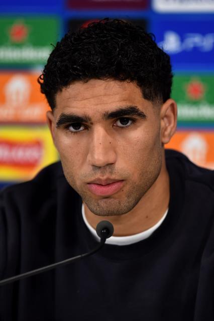 Paris Saint-Germain's Moroccan defender #02 Achraf Hakimi attends a press conference at Anfield stadium in Liverpool, north-west England on April 13, 2026, on the eve of their UEFA Champions League, quarter final second leg football match against Liverpool. (Photo by PETER POWELL / AFP)