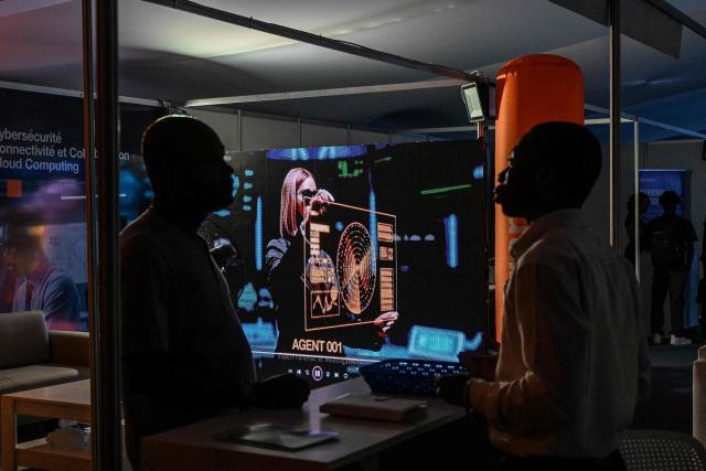 A general view of exhibitors during the 2nd edition of the International Exhibition on Artificial Intelligence, Defence and Space in Abidjan on April 13, 2026. (Photo by Issouf SANOGO / AFP)