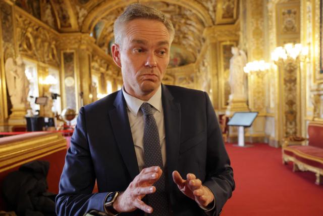 Les Republicains senator David Margueritte, a member of the Senate's Law Committee, speaks to journalists on the sidelines of the Senate debate on Justice Minister Gerald Darmanin's "loi SURE" (Useful, Fast and Effective Sentencing) criminal justice reform bill, which aims to shorten trial times, at the Senate in Paris on April 13, 2026. Lawyers across France staged a nationwide "Justice morte" (Dead Justice) stoppage called by most of the country's 164 bar associations, as the Senate opened debate on the bill which the government says is needed to tackle a backlog of more than 6,000 pending criminal cases. (Photo by Ludovic MARIN / AFP)