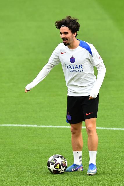 Paris Saint-Germain's Portuguese midfielder #17 Vitinha takes part in a team training session at Anfield stadium in Liverpool, north-west England on April 13, 2026, on the eve of their UEFA Champions League, quarter final second leg football match against Liverpool. (Photo by PETER POWELL / AFP)