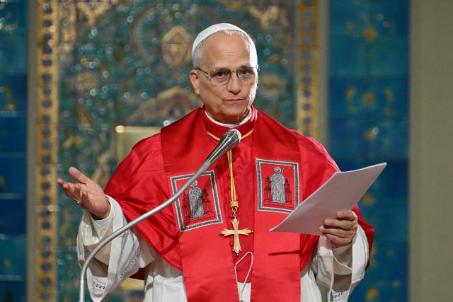 Pope Leo XIV addresses the Algerian community in the Basilica of Our Lady of Africa, in Algiers on April 13, 2026. Pope Leo XIV embarks today on an 11-day visit to Algeria, Cameroon, Angola and Equatorial Guinea for his first major international trip since becoming pontiff last year. (Photo by Alberto PIZZOLI / AFP)