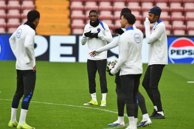 Paris Saint-Germain's French forward #10 Ousmane Dembele (C) and teammates take part in a team training session at Anfield stadium in Liverpool, north-west England on April 13, 2026, on the eve of their UEFA Champions League, quarter final second leg football match against Liverpool. (Photo by PETER POWELL / AFP)