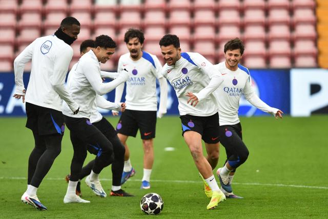 Paris Saint-Germain's Portuguese forward #09 Goncalo Ramos (2R) and teammates take part in a team training session at Anfield stadium in Liverpool, north-west England on April 13, 2026, on the eve of their UEFA Champions League, quarter final second leg football match against Liverpool. (Photo by PETER POWELL / AFP)
