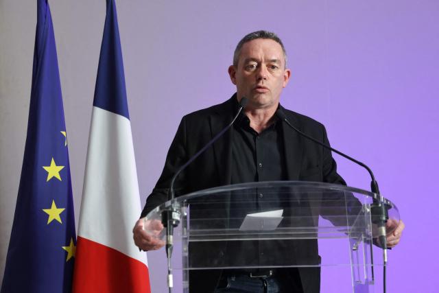 Deputy general secretary of CFDT union Yvan Ricordeau addresses the media during a press conference following a meeting between unions and France's Labour Minister Jean-Pierre Farandou (not pictured) to discuss the proposed May 1st bill, in Paris on April 13, 2026. (Photo by Ludovic MARIN / AFP)