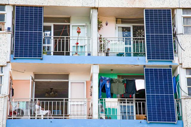 Solar panels are seen on a residential building in Matanzas, Cuba, on April 13, 2026. (Photo by AFP)
