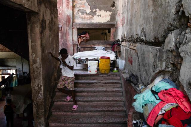A child is seen at a shelter for displaced people at the Rex Theatre in downtown Port-au-Prince, Haiti, on April 13, 2026. (Photo by Clarens SIFFROY / AFP)