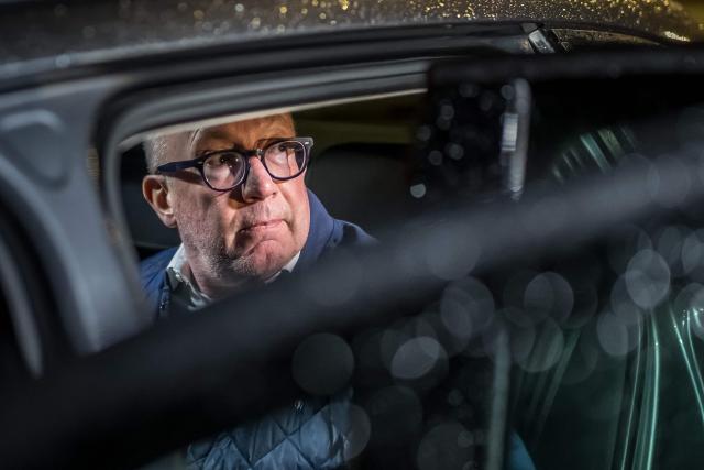 Mayor of Crans-Montana Nicolas Feraud looks out from a car leaving an hearing as part of the investigation over the fire that broke out in the bar "Le Constellation" during New Year celebrations, claiming 41 lives, most of them teenagers, and injuring 115 others, in Sion, western Switzerland, on April 13, 2026. (Photo by Fabrice COFFRINI / AFP)