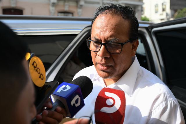 Peru's presidential candidate Roberto Sanchez, of the Juntos por el Peru party, speaks to the media in Lima on April 13, 2026. Two Peruvian right-wing candidates looked set on April 13, 2026, to advance to a presidential runoff, after an election marred by logistical foul-ups and deep voter anger. Voting is still underway at around a dozen polling places in Lima, where ballot materials failed to arrive on time for April 12 election. (Photo by Luis ROBAYO / AFP)