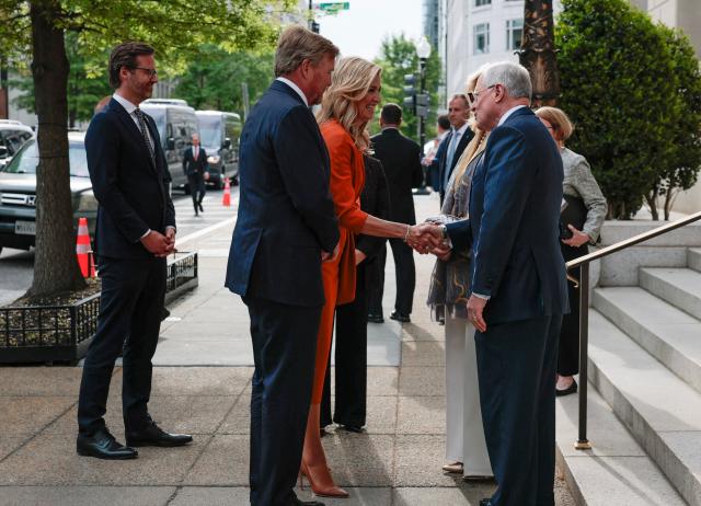 Dutch King Willem-Alexander and Queen Maxima are greeted upon arrival for an event at the US Chamber of Commerce in Washington, DC, on April 13, 2026. (Photo by Kent NISHIMURA / AFP)