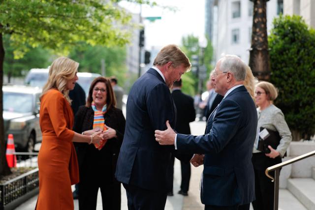 Dutch King Willem-Alexander (C) and Queen Maxima (L) are greeted upon arrival for an event at the US Chamber of Commerce in Washington, DC, on April 13, 2026. (Photo by Kent Nishimura / AFP)