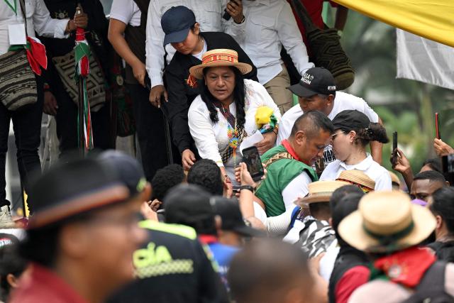Colombia's vice-presidential candidate Aida Quilcue (C), for the Pacto Historico party, greets a supporter during a campaign rally in Cali, Valle del Cauca department, Colombia on April 13, 2026. Colombia will hold presidential elections on May 31. (Photo by Joaquín SARMIENTO / AFP)