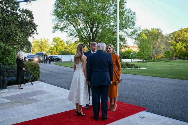 King of the Netherlands Willem-Alexander (C-L) and Queen Maxima (R) are welcomed by US President Donald Trump and First Lady Melania Trump into the White House in Washington, DC, on April 13, 2026. (Photo by Brendan SMIALOWSKI / AFP)