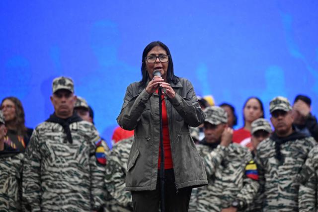 Venezuela's interim President Delcy Rodriguez delivers a speech during a civil-military parade marking the 24th anniversary of late Venezuelan president Hugo Chavez's (1999-2013) return to power after a failed 2002 coup, in Caracas on April 13, 2026. (Photo by Federico PARRA / AFP)