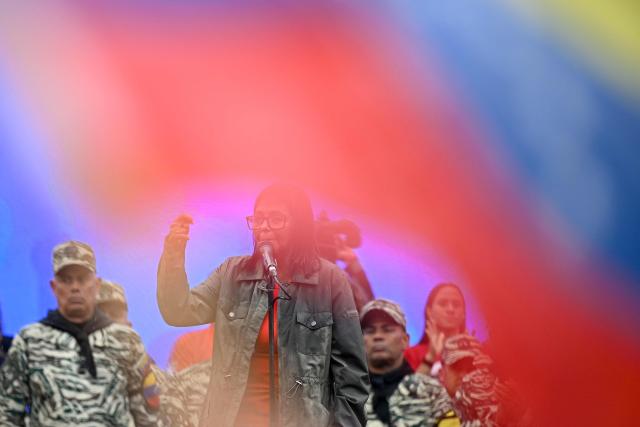 Venezuela's interim President Delcy Rodriguez delivers a speech during a civil-military parade marking the 24th anniversary of late Venezuelan president Hugo Chavez's (1999-2013) return to power after a failed 2002 coup, in Caracas on April 13, 2026. (Photo by Federico PARRA / AFP)