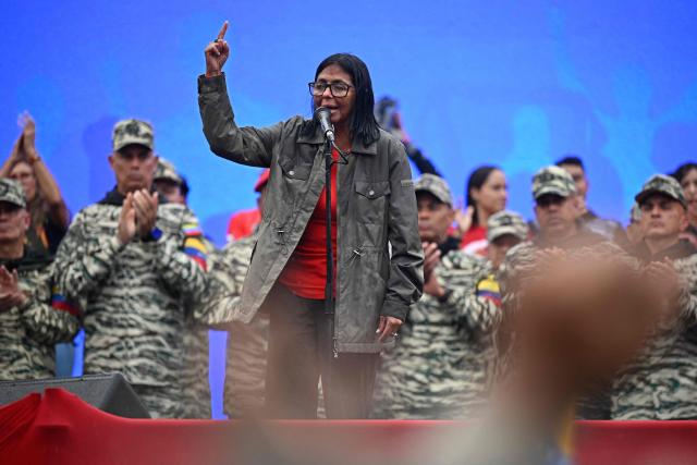 Venezuela's interim President Delcy Rodriguez delivers a speech during a civil-military parade marking the 24th anniversary of late Venezuelan president Hugo Chavez's (1999-2013) return to power after a failed 2002 coup, in Caracas on April 13, 2026. (Photo by Federico PARRA / AFP)