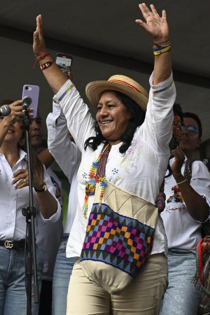 Colombia's vice-presidential candidate Aida Quilcue, for the Pacto Historico party, waves to supporters during a campaign rally in Cali, Valle del Cauca department, Colombia on April 13, 2026. Colombia will hold presidential elections on May 31. (Photo by JOAQUIN SARMIENTO / AFP)