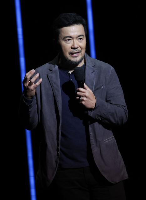 Taiwanese-US director Justin Lin promotes the movie "Helldivers" onstage during the Sony Pictures Entertainment Presentation & Opening Night at CinemaCon at The Colosseum at Caesars Palace on April 13, 2026 in Las Vegas, Nevada. (Photo by VALERIE MACON / AFP)