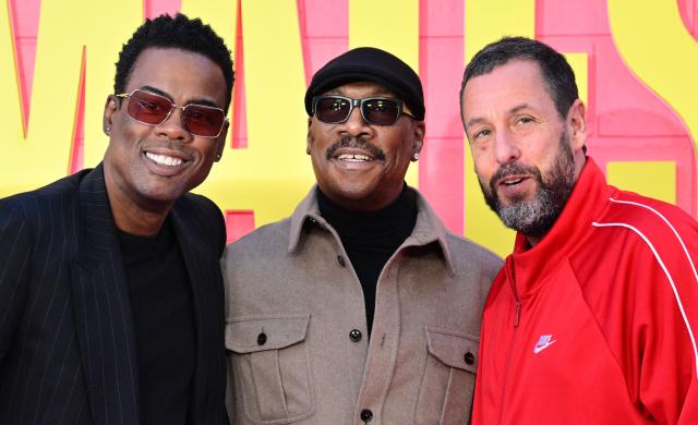 US actors Chris Tucker, Eddie Murphy and Adam Sandler attend  Netflix's "Roommates" premiere at the Egyptian Theater in Los Angeles, on April 13, 2026. (Photo by Frederic J. BROWN / AFP)