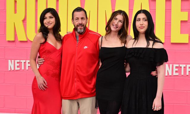 US actor Adam Sandler, his wife Jackie Sandler and daughters Sunny Sandler and Sadie Sandler, attend Netflix's "Roommates" premiere at the Egyptian Theater in Los Angeles, on April 13, 2026. (Photo by Frederic J. BROWN / AFP)