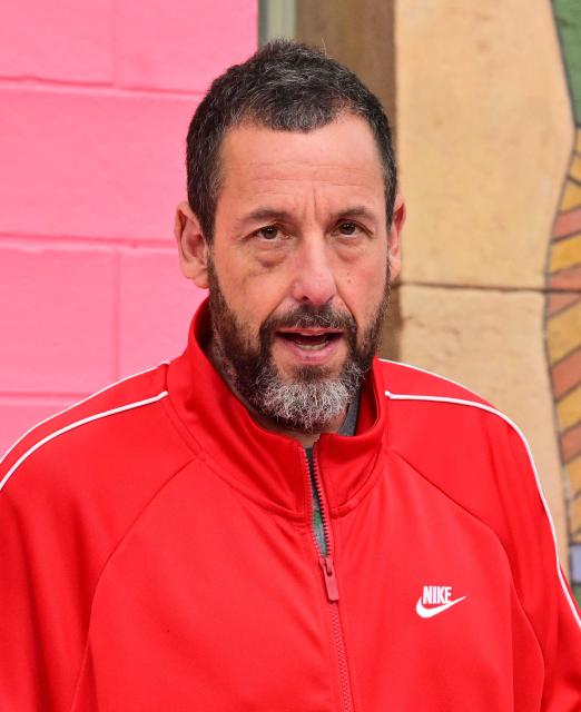 US actor Adam Sandler attends Netflix's "Roommates" premiere at the Egyptian Theater in Los Angeles, on April 13, 2026. (Photo by Frederic J. BROWN / AFP)