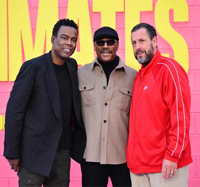 US actors Chris Tucker, Eddie Murphy and Adam Sandler attend  Netflix's "Roommates" premiere at the Egyptian Theater in Los Angeles, on April 13, 2026. (Photo by Frederic J. BROWN / AFP)