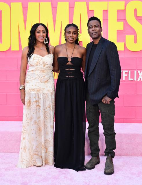Malaak Compton-Rock, Zahra Rock and US actor Chris Rock attend Netflix's "Roommates" premiere at the Egyptian Theater in Los Angeles, on April 13, 2026. (Photo by Frederic J. BROWN / AFP)