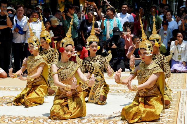 Dancers perform during Khmer New Year (Nokor Sankranta) celebrations at Wat Phnom in Phnom Penh on April 14, 2026. (Photo by TANG CHHIN Sothy / AFP)