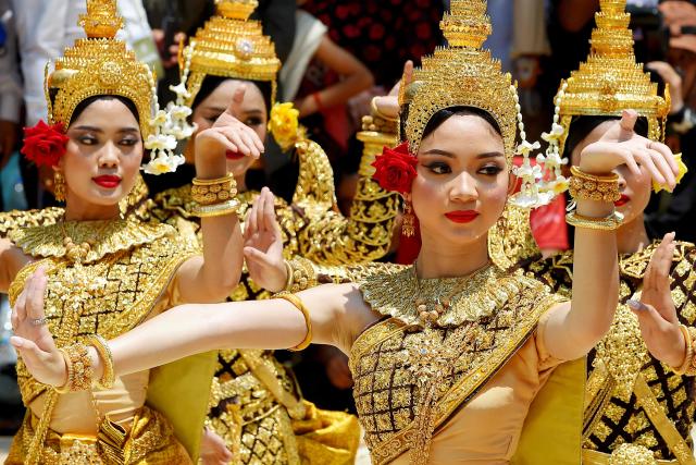 Dancers perform during Khmer New Year (Nokor Sankranta) celebrations at Wat Phnom in Phnom Penh on April 14, 2026. (Photo by TANG CHHIN Sothy / AFP)