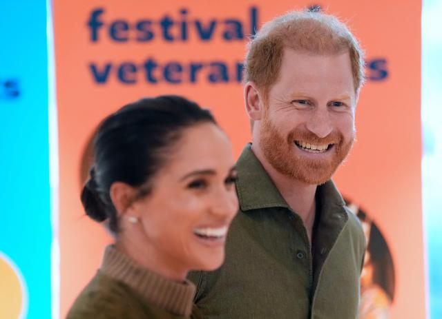 Britain's Prince Harry (R), Duke of Sussex, and his wife Meghan (L), the Duchess of Sussex, arrive at the Australian National Veterans Arts Museum (ANVAM) in Melbourne on April 14, 2026. (Photo by Jonathan Brady / POOL / AFP)