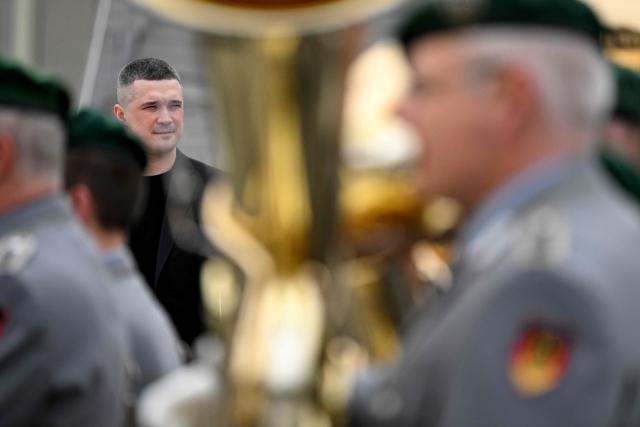 Ukraine's Defence Minister Mykhailo Fedorov (L) attends an official welcome ceremony at the German Defence Ministry, on April 14, 2026 in Berlin. (Photo by RALF HIRSCHBERGER / AFP)