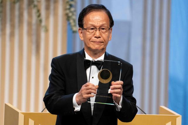 Japanese doctor Shizuo Akira, winner of the Japan Prize in the field of Life Sciences, poses during the Japan Prize presentation ceremony in Tokyo on April 14, 2026. (Photo by Yuichi YAMAZAKI / AFP)