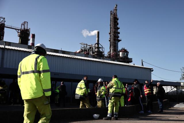 Workers gather for a demonstration at the industrial site of Fibre Excellence Group in Tarascon, south-eastern France on April 14, 2026, as two Fibre Excellence Group' sites in Tarascon and Saint-Gaudens face closure. The Fibre Excellence Group, a pulp paper producer, has announced on April 13, 2026 that it will declare itself insolvent, but "remains convinced that a solution is still possible" for its future, based on progress made in discussions with the state. (Photo by Thibaud MORITZ / AFP)