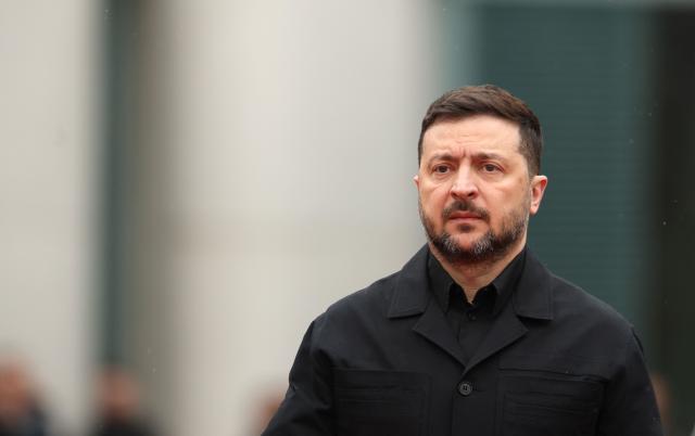 Ukrainian President Volodymyr Zelensky arrives for a visit at the Chancellery in Berlin on April 14, 2026 prior to German-Ukrainian government consultations. The meeting comes as US-initiated peace talks between Russia and Ukraine have stalled, with Kyiv baulking at the idea it could cede territory to Russia. (Photo by Odd ANDERSEN / AFP)