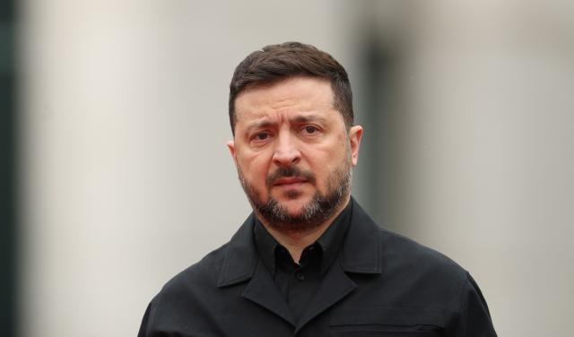 Ukrainian President Volodymyr Zelensky arrives for a visit at the Chancellery in Berlin on April 14, 2026 prior to German-Ukrainian government consultations. The meeting comes as US-initiated peace talks between Russia and Ukraine have stalled, with Kyiv baulking at the idea it could cede territory to Russia. (Photo by Odd ANDERSEN / AFP)