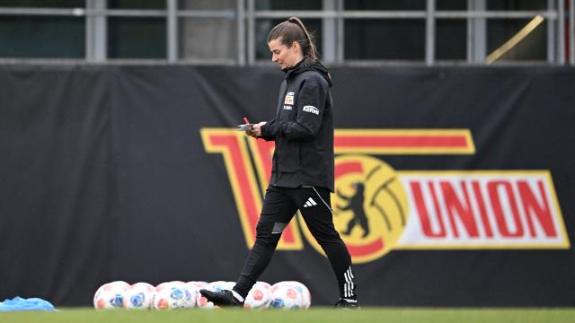 Union Berlin's new German head coach Marie-Louise Eta attends a training session of the  German first division Bundesliga football club 1 FC Union Berlin in Berlin on April 14, 2026. Bundesliga club Union Berlin named Marie-Louise Eta as head coach, making her the first female manager of a men's team in a top-five European league, after former mentor Steffen Baumgart was sacked. The 34-year-old will take over for the remainder of the season. (Photo by RALF HIRSCHBERGER / AFP)