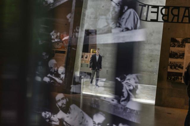 An Israeli man visits the Yad Vashem Holocaust Memorial Museum in Jerusalem during the annual Holocaust Remembrance Day on April 14, 2026. Israel came to a standstill on April 14, as sirens sounded across the country in tribute to the six million Jews murdered by the Nazis during World War II. This year's commemoration comes amid a fragile two-week ceasefire with Iran after a deadly war that began on February 28, when a joint US-Israeli air attack killed Iran's supreme leader (Photo by Ilia YEFIMOVICH / AFP)
