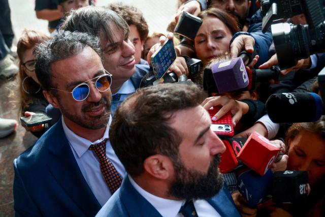Argentine football legend Diego Maradona's former medical doctor Leopoldo Luque arrives at courthouse for a preliminary hearing in a trial over his death in San Isidro, outskirts of Buenos Aires on April 14, 2026.  (Photo by Tomas CUESTA / AFP)