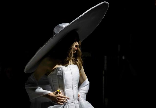 A model presents a creation made from Baltic amber at a fashion show during the Amberif Fair in Gdansk on March 26, 2026. Around 200 exhibitors take part in this year’s Amberif, a fair held annually in Gdansk where entrepreneurs, craftsmen and artists from all over the world who work with amber can sell or buy amber, establish new contracts or simply showcase their offerings. (Photo by Wojtek RADWANSKI / AFP)