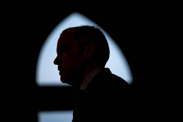 Canadian Prime Minister Mark Carney speaks during a press conference at the West Block on Parliament Hill in Ottawa, Ontario, Canada, on April 14, 2026. Carney's Liberal party secured a majority in Canada's parliament on April 13 after winning all three by-election seats up for grabs, boosting his Liberals as they work to bolster a country shaken by threats from the United States. (Photo by ANDREJ IVANOV / AFP)