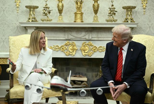 (FILES) US President Donald Trump meets with Italian Prime Minister Giorgia Meloni in the Oval Office of the White House in Washington, DC, on April 17, 2025. US President Donald Trump on April 14, 2026 launched a stinging criticism of Italy's Prime Minister Giorgia Meloni, one of his main European allies, over her unwillingness to join the Iran war. "I'm shocked at her. I thought she had courage, but I was wrong," he said in an interview with Italian daily Corriere della Sera. Meloni, Italy's far-right leader since October 2022, has been one of Trump's closest allies in Europe and often seeks to act as a mediator between diverging US and European views. (Photo by Brendan SMIALOWSKI / AFP)